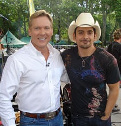 rista Nashville superstar Brad Paisley is this week’s champion on the sales chart with the #1 debut of his new album, American Saturday Night.  Here, Paisley is pictured with Good Morning America’s Sam Champion when Brad was in New York on Friday to play GMA’s Summer Concert Series.  Brad follows the three-week #1 success of American Saturday Night’s first smash, “Then,” with his new single, “Welcome to the Future,” officially impacting radio on Monday.