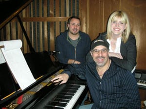 Pictured l to r standing: Producer Lex Lipsitz, Emma Jacob Seated: Jimmy Nichols, producer/president Black River Music Group