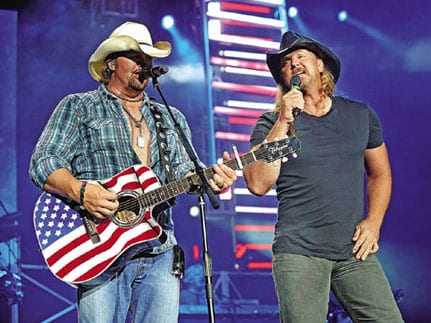 Trace Adkins is supporting Toby Keith on his current "America's Toughest Tour." But nothing could have prepared the two for the reaction they've been getting when Toby brings Trace back out on stage for an encore performance of Keith's monster hit "Courtesy of the Red, White & Blue (The Angry America)." The natural connection between the two artists is obvious to the crowds and, in retrospect, to Toby as well. Keith has been bringing Adkins out for the explosive performance each night of the tour, which started in June and runs through September.