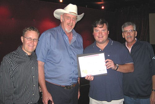 Aleep At The Wheel was honored at this year's Americana Awards for Lifetime Achievement in Performance.  At a recent celebration of the award, the CMA also presented them with a plaque in recognition of 40 years of furthering country music.  Pictured L-R:  Business Manager Peter Schwarz, Asleep At The Wheel's Ray Benson, CMA's Hank Adam Locklin and ASCAP's Herky Williams.