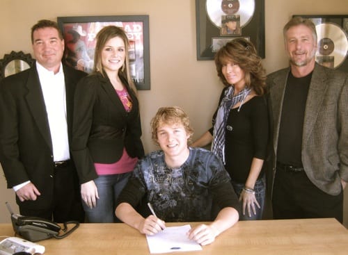 Kroll has had a single on Sean Patrick McGraw, performed on Jimmy Kimmel and on CMT & GAC. Pictured (L-R) Back: Owner Daniel Wood, staff writer Blake Gray, Creative Director Holly Nance, Owner Danny Pool, Seated: Kroll.