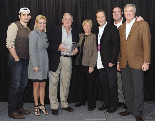 (l-r) co-host of "The 43rd Annual CMA Awards," Brad Paisley; CMA Chief Executive Officer, Tammy Genovese; Miller; daughter of Miller, Debbie Miller; CMA Awards Executive Producer, Robert Deaton; Former CMA Awards host and member of Country Music Hall of Fame, Vince Gill; and Director, CMA Awards and son of Miller, Paul Miller. Photographer: John Russell / CMA