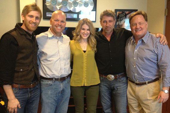 The Henningsens recently met up with Clear Channel’s Clay Hunnicutt at Sony Music’s Nashville office. The family's latest single, "America Beautiful," takes our No. 60 spot this week. Pictured (L-R): Aaron Henningsen; Clay Hunnicutt (SVP of Programming at Clear Channel); Clara Henningsen; Brian Henningsen; and, Gary Overton (Chairman & CEO, Sony Music Nashville).