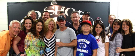 Kenny Chesney inaugurated the "No Shoes Nation" Tour in Tampa by meet with radio across the state. The forthcoming album's single, "Pirate Flag" lands at No. 6 this week on the MusicRow Chart. Pictured (L-R) Back: Mike Culotta (OM/PD, WQYK); JR Shumann (PD, WWKA Orlando); Jay Roberts (MD, WQYK/Tampa); Mike James (PD, WPCV/Lakeland); Travis Daily (PD, WFUS/Tampa); Christine Daily, (wife of Travis Daily); and RJ Meacham (Columbia Nashville). Front: Hank Dale, midday (WQYK/Tampa); Michele Chase (MD, WGNE/Jacksonville); Val St. John (MD WWGR/Ft. Myers); Jeni Taylor (MD WPCV/Lakeland); Kenny Chesney; Zen Davis (son of Travis Daily); Rebecca Kaplan (WFUS/Tampa); Kim Goddard (Mike Culotta's girlfriend); Jeri Cooper (Columbia Nashville).