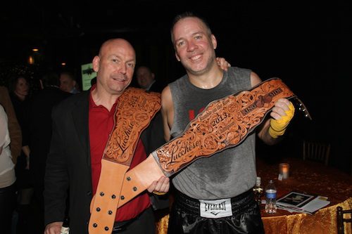 Pictured (L-R): Jimmy Rector (EMI Nashville) and Keith Gale (RCA) display their Lucchese “Rumble on the Row” hand-tooled championship belts.Photo: Karen Will Rogers