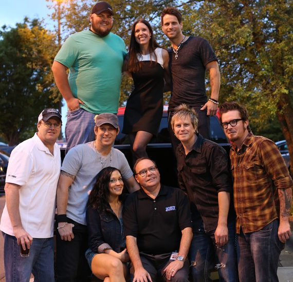 Stoney Creek Records' Parmalee recently paid a visit to its home state of North Carolina to play its single “Carolina” for WSOC/Charlotte. Pictured (L-R) Top: WSOC’s ‘Big Sexy,’ Chele Fassig, and Parmalee’s Matt Thomas. Bottom: Rob Taanner (WSOC), Scott Thomas (Parmalee); WSOC’s Brittney Carson, Rick McCracken, Barry Knox and Josh McSwain. 