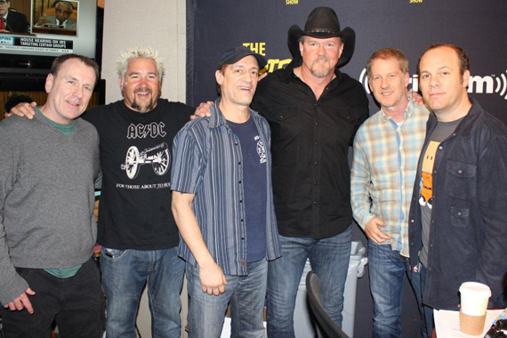 Opie & Anthony’s SiriusXM show invited Trace Adkins, Colin Quinn, Guy Fieri, and Tom Papa on air in New York City on Friday, May 17. Pictured (L-R): Colin Quinn, Guy Fieri, SiriusXM host Anthony Cumia, Trace Adkins, SiriusXM host Opie Hughes, Tom Papa. Photo: Erik Nagel
