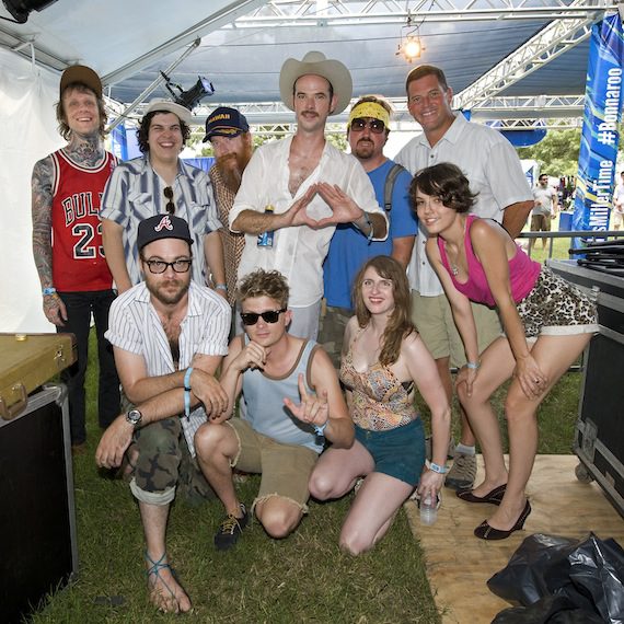 BMI’s Mark Mason (back row, far right) grabs a quick photo with Road to Bonnaroo winner Ri¢hie at the 2013 Bonnaroo Music and Arts Festival