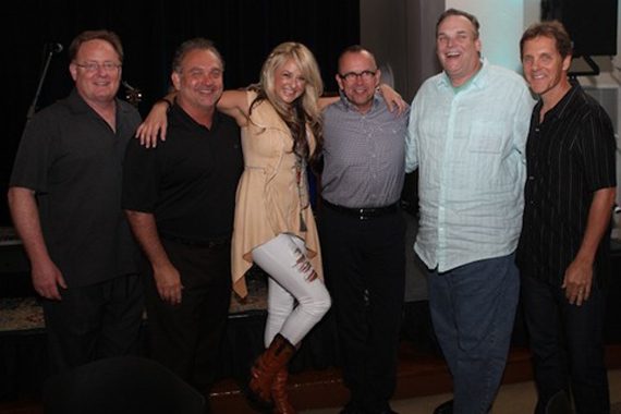 Leah Turner performed for a gathering of industry executives and Country Radio Broadcasters board members at The Chapel on Wednesday, June 19 in conjunction with the June 19-21 CRB board and CRS agenda committee meetings. Pictured (L-R): Gary Overton (Sony Music Nashville), Mike Culotta (CRS President), Leah Turner,Charlie Morgan (WLHK), Bill Mayne (CRS Executive Director), Norbert Nix (Columbia Nashville). Photo Credit: Kristen England