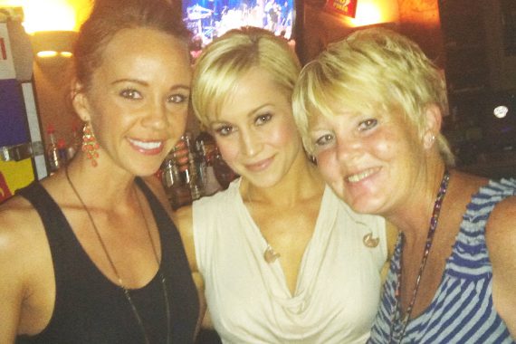Kellie Pickler recently visited with KMDL/Lafayette's Stephanie Crist during her 18th CMA Music Fest before playing a show at The Stage on Friday night in Nashville. Pickler lands at No. 44 on this week’s MusicRow Chart with her debut Black River single “Someone, Somewhere Tonight.” Pictured (L-R):  Megan Boardman (Black River), Kellie Pickler, Stephanie Crist
