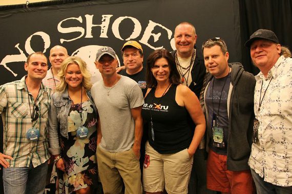 Kenny Chesney caught up with radio programmers before a sold-out show at Lincoln Financial Field in Philadelphia. Chesney’s latest single, “When I See This Bar,” is this week’s greatest spin increase. Pictured (L-R): Jeff Hurley (Clear Channel Harrisburg/Allentown OM), Dave Hovel (WXCY Wilmington, DE PD), Tanya Burko (WGGY Wilkes-Barre APD/MD), Chesney, Joe Kelly (WPUR Atlantic City), Shelly Easton (WXTU Philadelphia PD), Mark Razz (WXTU Philadelphia APD/MD), David Friedman (Columbia Nashville Promo), Scot Michaels (Morris Management)