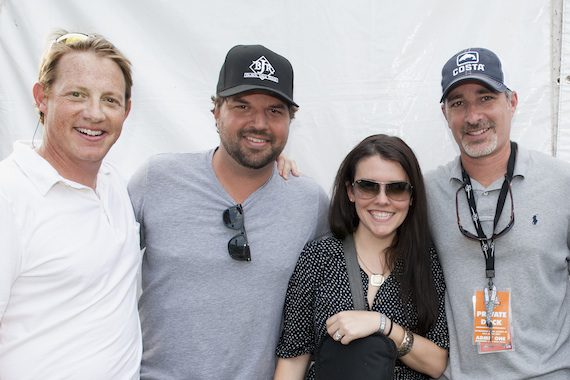 Pictured (L-R): BMI's Clay Bradley, Dallas Davidson, Native Run's Annie Clements and Universal’s Steve Hodges gather for a photo backstage at the BMI Tailgate Party outside LP Field during 2013 CMA Music Festival. (Erika Goldring Photo)