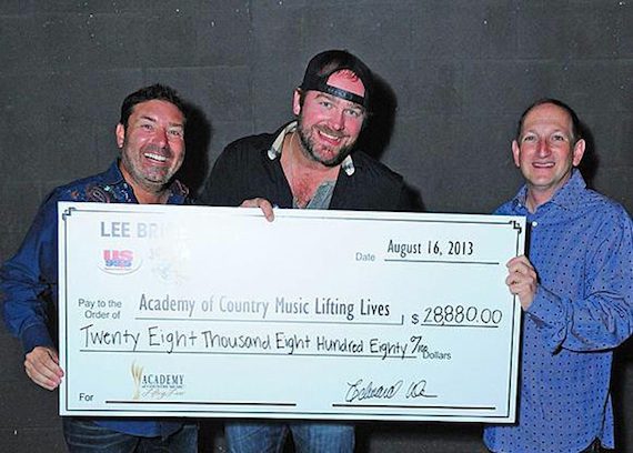 Pictured (L-R): Tommy Disanto, Joe’s Bar Co-Owner; Lee Brice; Ed Warm, Joe’s Bar Co-Owner and ACM Lifting Lives and ACM Board Member). 