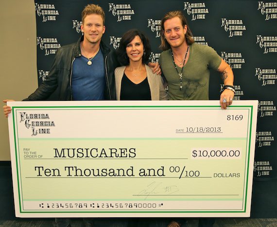  Pictured (L-R): FGL’s Brian Kelley; Executive Director of MusiCares Debbie Carroll, LCSW; FGL’s Tyler Hubbard. Photo: Justin Mrusek