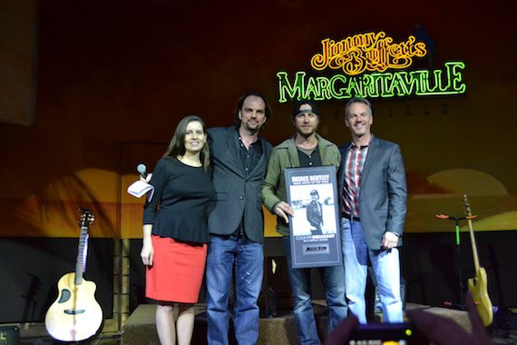 Dierks Bentley receives the MusicRow CountryBreakout Male Artist of the Year Award on Tuesday, Feb. 26, 2013. Pictured (L-R) Sarah Skates (MusicRow Senior News Editor), Sherod Robertson (MusicRow Publisher/Owner), Dierks Bentley, Steve Hodges (UMG Nashville, Sr. VP Promotions). 