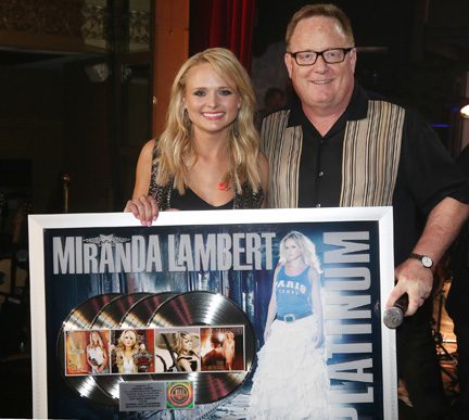 At the Sony Music Nashville Boat Show, Chairman & CEO Gary Overton surprised Miranda Lambert with a plaque commemorating the Platinum certification of each of her first four albums. (L-R): Lambert, Overton. Photo:  Alan Poizner