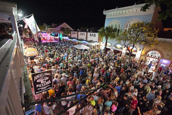 Pictured (L-R): Fans pack Duval Street during Sara Evans' performance. Photographer: Erika Goldring