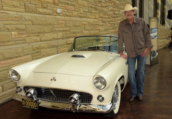 Alan Jackson poses beside his 1955 Ford Thunderbird at the opening of his "Alan Jackson: 25 Years of Keepin' It Country" exhibit at the Country Music Hall of Fame and Museum on August 27, 2014 in Nashville, Tennessee.  (Photo by Rick Diamond/Getty Images for Country Music Hall Of Fame And Museum)  
