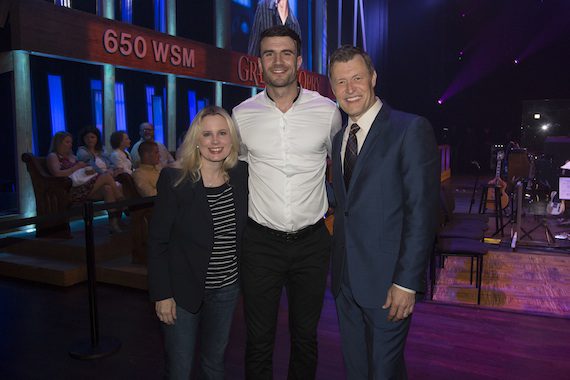 Pictured (L-R): Cindy Mabe, President, UMG Nashville; Sam Hunt; Bill Cody, Opry Announcer. Photo: Chris Hollo