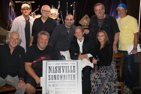 Pictured (L-R): Jeff Silbar, Craig Wiseman, author Jake Brown with arm around Freddy Powers and Catherine Powers. Standing (L-R): Neil Thrasher, Sonny Curtis, Bob DiPiero and Kelley Lovelace. Photo: Kindell Moore    