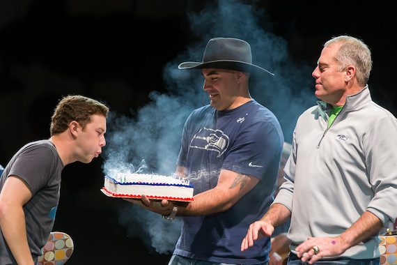 Scotty McCreery blows out the candle on his birthday cake. Photo: David Conger
