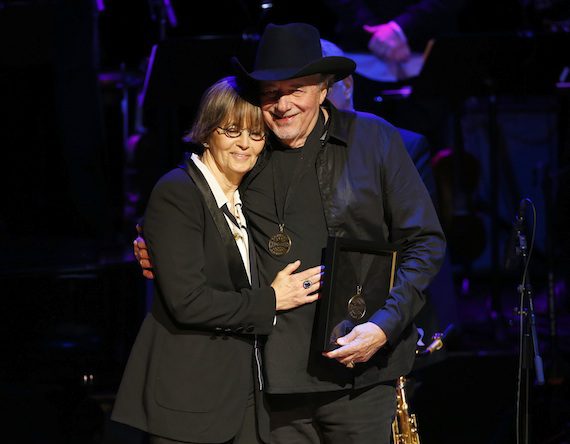 Suzi Cochran and Bobby Bare induct the late Hank Cochran at the 2014 Country Music Hall of Fame Induction Ceremony. Photo: Donn Jones