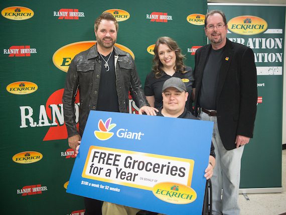 Air Force Staff Sergeant Christopher Solso and his wife, Clare, are presented free groceries for a year and a VIP trip to Tucson, Arizona on behalf of Eckrich.