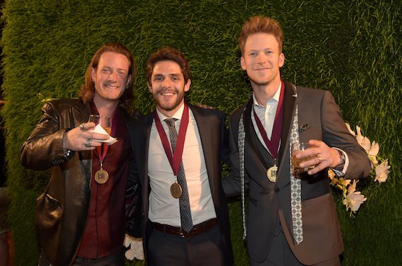 Tyler Hubbard of Florida Georgia Line, singer-songwriter Thomas Rhett, and Brian Kelley of Florida Georgia Line attend the BMI 2014 Country Awards. Photo: Rick Diamond/Getty Images for BMI
