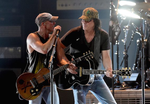 Joe Walsh joins Kenny Chesney for several songs in Nashville. Photo: Rick Diamond/Getty Images