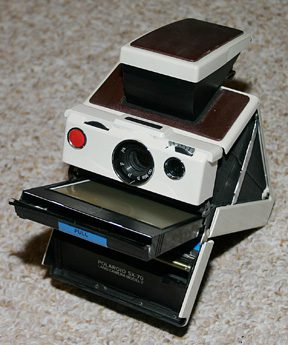 SX-70 Model 2 with film cartridge protruding from the front. Photo: Wikipedia