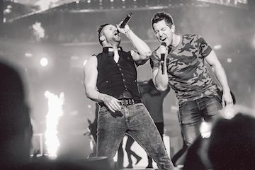 Skillet's John Cooper (L) and Jeremy Camp share the stage at Winter Jam. Photo: Adam Mowery 