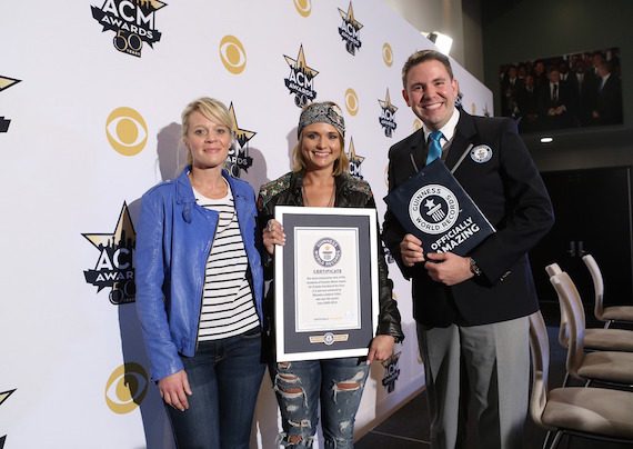 Pictured (L-R): Tiffany Moon, EVP, Managing Director of the Academy of Country Music; Miranda Lambert; Michael Empric, Guinness World Records. Photo: Getty Images.