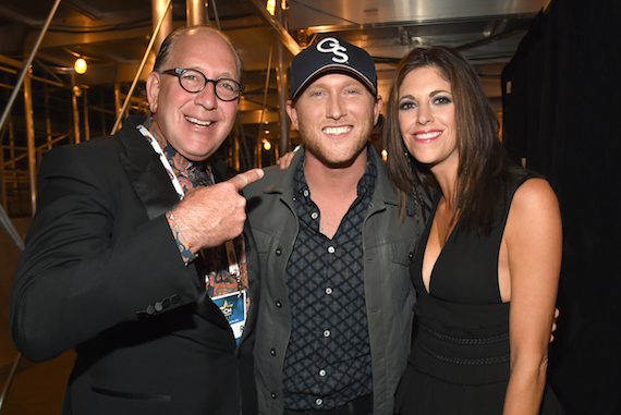 Pictured (L-R): John Esposito, Cole Swindell, Kerri Edwards. Photo: Rick Diamond/ACM2015/Getty Images for DCP