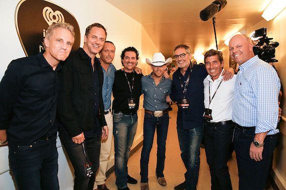 Pictured (L-R): John Sykes, Tom Poleman, Tim McGraw, Scott Borchetta, Justin Moore, Bob Pittman, Rich Bressler and Clay Hunnicutt.