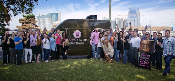 Carrie Underwood and Ivey Childers (IveyCakes) with the Nash Campus staff.