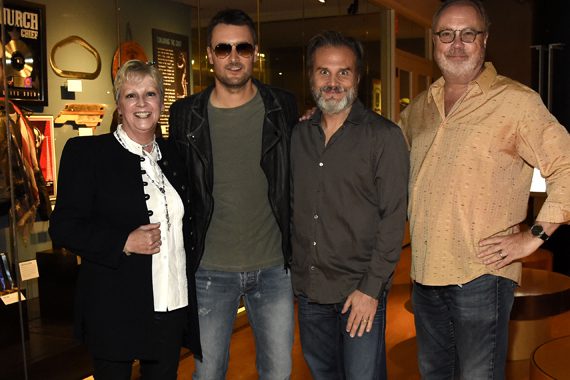 VIP preview of Eric Church's exhibit at the Country Music Hall of Fame. Pictured (L-R): Pictured are (l-r): Country Music Hall of Fame and Museum's Carolyn Tate, Eric Church, John Peets, and Universal Music Group's Mike Dungan. Photo: Rick Diamond, Getty Images for the Country Music Hall of Fame and Museum