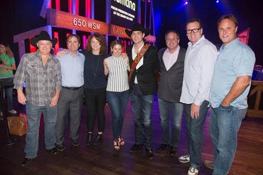Pictured left to right in Photo 1: Mike Taliaferro (Manager, Carter & Co.), Joe Carter (Manager, Carter & Co.), Lisa Ray (VP Brand Management, WMN), Cris Lacy (VP A&R, WMN), William Michael Morgan, Pete Fisher (VP and GM, Grand Ole Opry), Peter Strickland (GM & EVP, WMN) and Scott Hendricks (EVP A&R, WMN). 
