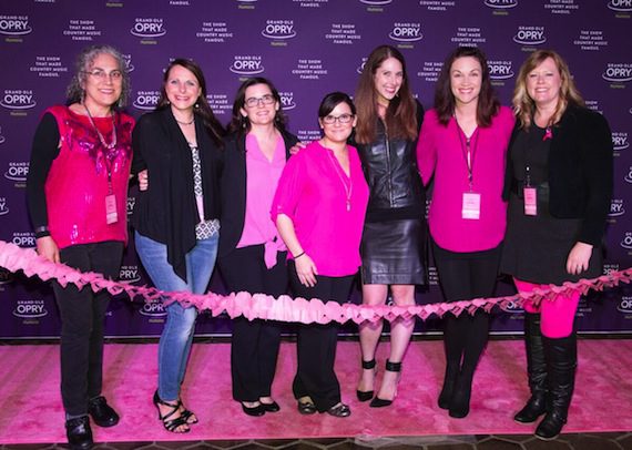 Members of the Women Rock For The Cure board members walk the pink carpet prior to the 7th Annual Opry Goes Pink show. Pictured (L-R): WRFTC Board Member Adie MacKenzie, WRFTC Board Member & Survivor Jessi Pruitt, WRFTC Co-Founder Rebekah Lee Beard, WRFTC Co-Founder Liz Lee Schullo, WRFTC Co-Founder & President Jensen Sussman, WRFTC Board Member Michelle Tigard Kammerer and WRFTC Board Member Jenny Ciali