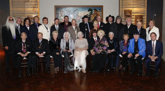 Pictured are (back row, l-r): 2015 inductees William Lee Golden, Joe Bonsall, Richard Sterban, and Duane Allen of the Oak Ridge Boys; Ray Walker of the Jordanaires; Country Music Hall of Fame and Museum Chairman Steve Turner; Vince Gill; E.W. “Bud” Wendell; Bobby Bare; Country Music Hall of Fame and Museum CEO Kyle Young; Garth Brooks; Randy Owen of Alabama; Kenny Rogers; Charlie McCoy; and CMA CEO Sarah Trahern; (front row, l-r): Ralph Emery; Harold Bradley; Connie Smith; Emmylou Harris; 2015 inductee Bonnie Brown; Joshua Martin, son of 2015 inductee Grady Martin; Brenda Lee; 2015 inductee Maxine Brown; Jo Walker-Meador; Roy Clark; and Country Music Hall of Fame and Museum Board Trustee Jody Williams. Photo by Donn Jones