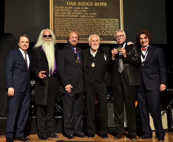 The Oak Ridge Boys are inducted into the Country Music Hall of Fame. Pictured (L-R): Jody Williams, William Lee Golden, Duane Allen, Kenny Rogers, Joe Bonsall, and Richard Sterban 