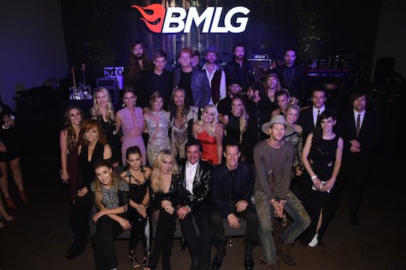 Pictured (L-R, Back Row):- A Thousand Horses' Graham Deloach, Levi Hummon, Seth Alley, A Thousand Horses' Bill Satcher, Drake White, Ronnie Dunn And A Thousand Horses' Zach Brown. Middle Row: Tara Thompson, Reba, Ashley Campbell, Jennifer Nettles, Cassadee Pope, Steven Tyler, RaeLynn, Danielle Bradbery, Brantley Gilbert, Thomas Rhett, A Thousand Horses' Michael Hobby, Savannah Keyes, The Band Perry's Kimberly Perry, Aubrey Peeples, TBP's Reid Perry and Neil Perry. Front Row: Maddie & Tae, BMLG SVP, Creative Sandi Spika Borchetta, BMLG President/CEO Scott Borchetta, Florida Georgia Line's Tyler Hubbard And Brian Kelley. Photo: Getty Images for BMLG.