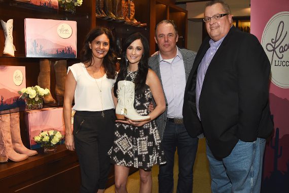 Pictured (L-R): Jennifer Huggins, Lucchese; Kacey Musgraves; and Lucchese's Doug Kindy and Randy Steele. Photo: Rick Diamond/Getty Images