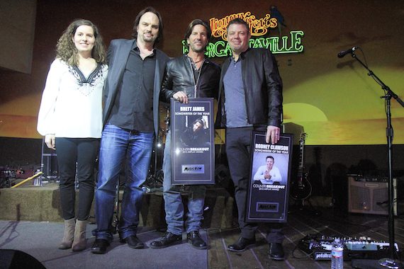 Pictured (L-R): MR’s Sarah Skates and Sherod Robertson present Songwriter of the Year honors to Brett James and Rodney Clawson. Photo: Bev Moser/Moments By Moser