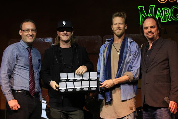 Florida Georgia Line accepts MusicRow No. 1 Challenge Coins for chart toppers on the CountryBreakout chart. Pictured (L-R): MusicRow's GM Craig Shelburne; Florida Georgia Line's Tyler Hubbard and Brian Kelley; MusicRow's Owner/Publisher Sherod Robertson.