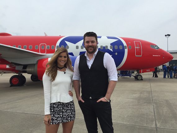 Republic Nashville’s Cassadee Pope and RCA Records’ Chris Young in front of Southwest Airlines’ Tennessee One.