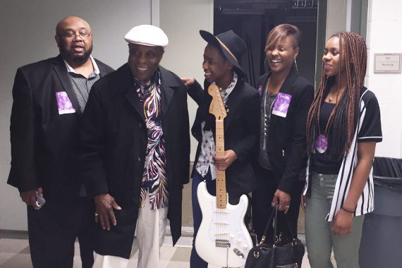 Buddy Guy with Sophia Gulley and recipients from local organization, YEAH.
