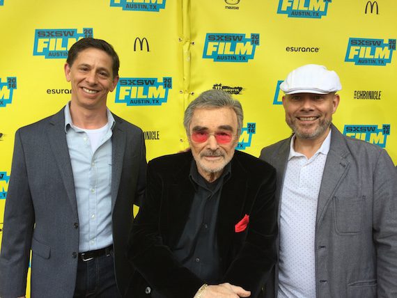Pictured (L-R): CMT's Lewis Bogach, "Smokey and the Bandit" star Burt Reynolds, and John Miller-Monzon 