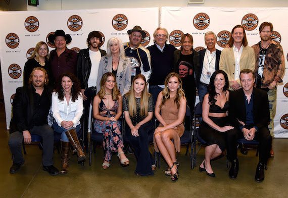 Pictured (Back row, L-R): Mayor of Nashville Megan Barry, Tracy Lawrence, Chris Janson, Emmylou Harris, Vince Gill, Country Music Hall of Fame and Museum CEO Kyle Young, Keith Urban, Gary Borman, Tyler Hubbard and Brian Kelley of Florida Georgia Line. (Front row, L-R): Gary Burr, Georgia Middleman, Maren Morris, Madison Marlow and Taylor Dye of Maddie & Tae, Amanda Shires, and Jason Isbell attend All For The Hall at the Bridgestone Arena on April 12, 2016 in Nashville, Tennessee. (Photo by Rick Diamond/Getty Images for the Country Music Hall Of Fame and Museum) Photo by Rick Diamond, Getty Images