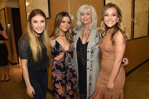 Pictured (L-R): Madison Marlow of Maddie & Tae, singer-songwriters Maren Morris and Emmylou Harris, and Taylor Dye of Maddie & Tae attend All For The Hall at the Bridgestone Arena on April 12, 2016 in Nashville, Tennessee. (Photo by Rick Diamond/Getty Images for The Country Music Hall Of Fame & Museum)