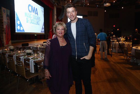 Brett Eldredge, host of the CMA Music Teacher of Excellence, welcomes his own childhood music teacher, Judy Carroll, as his special guest at the inaugural honors evening at City Winery Tuesday in Nashville. Photo: Kayla Schoen / CMA
